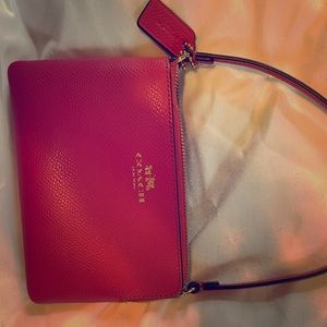 Hot pink Coach wristlet